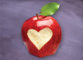 Apple with heart shape carved into it